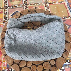 Woven suede knot bag